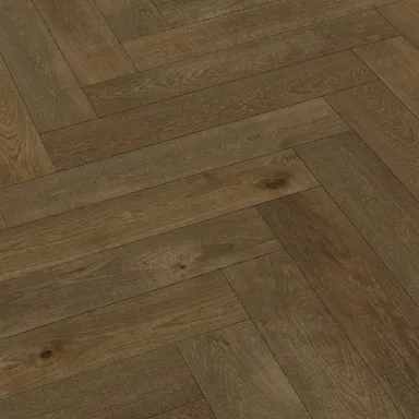 Hier ist ein dunkler Fertigparkettboden in Fischgrätoptik zu sehen.