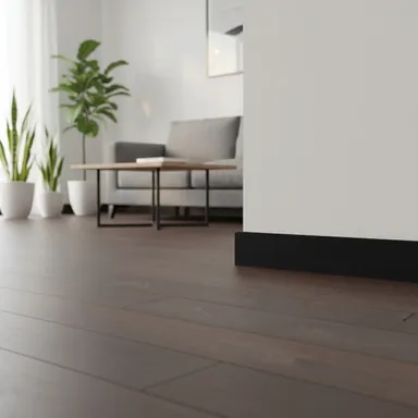 Hier ist ein Ambiente Bild einer dunklen Sockelleiste zu sehen.