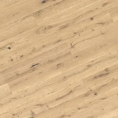 Hier ist ein Bild eines hellen Parkettbodens zu sehen.