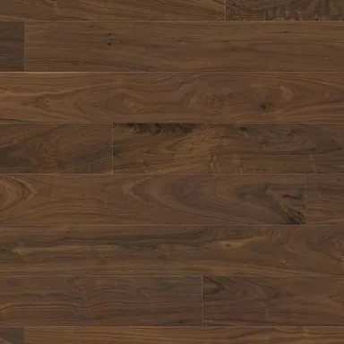 Hier ist ein Produktbild eines dunklen Nussbaum Parketts in Landhausdielen Optik zu sehen.